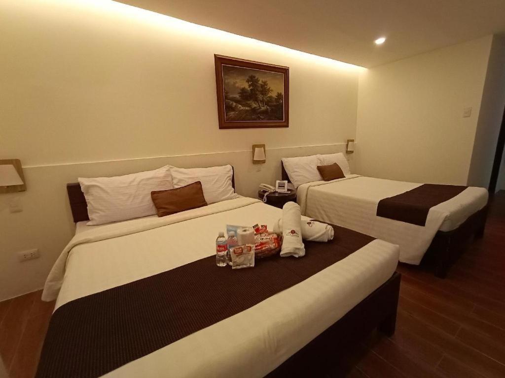 Hotel Asuncion Laoag Bagian luar foto