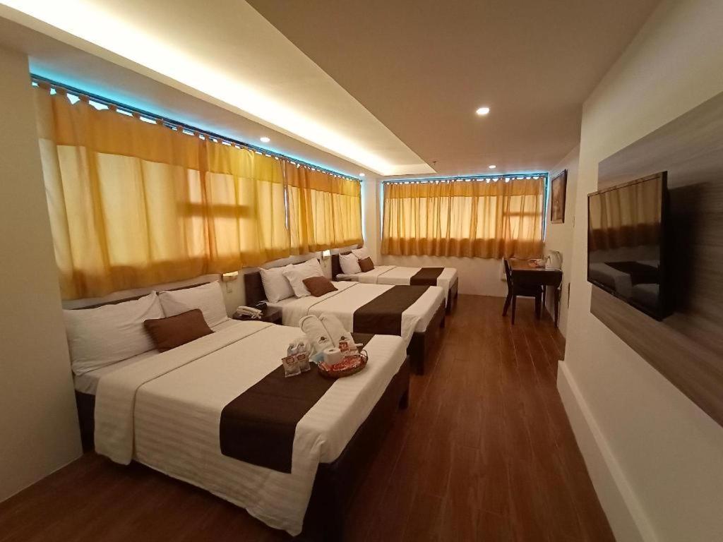 Hotel Asuncion Laoag Bagian luar foto