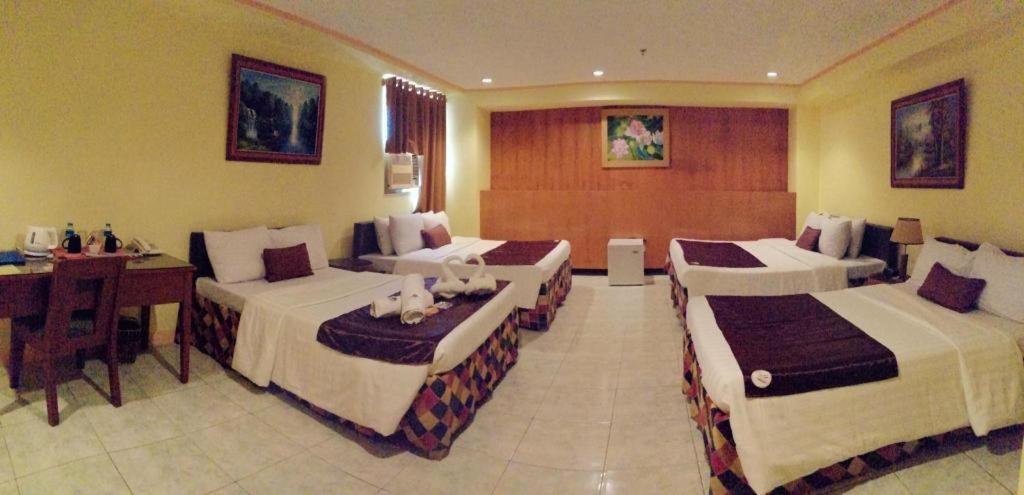 Hotel Asuncion Laoag Bagian luar foto