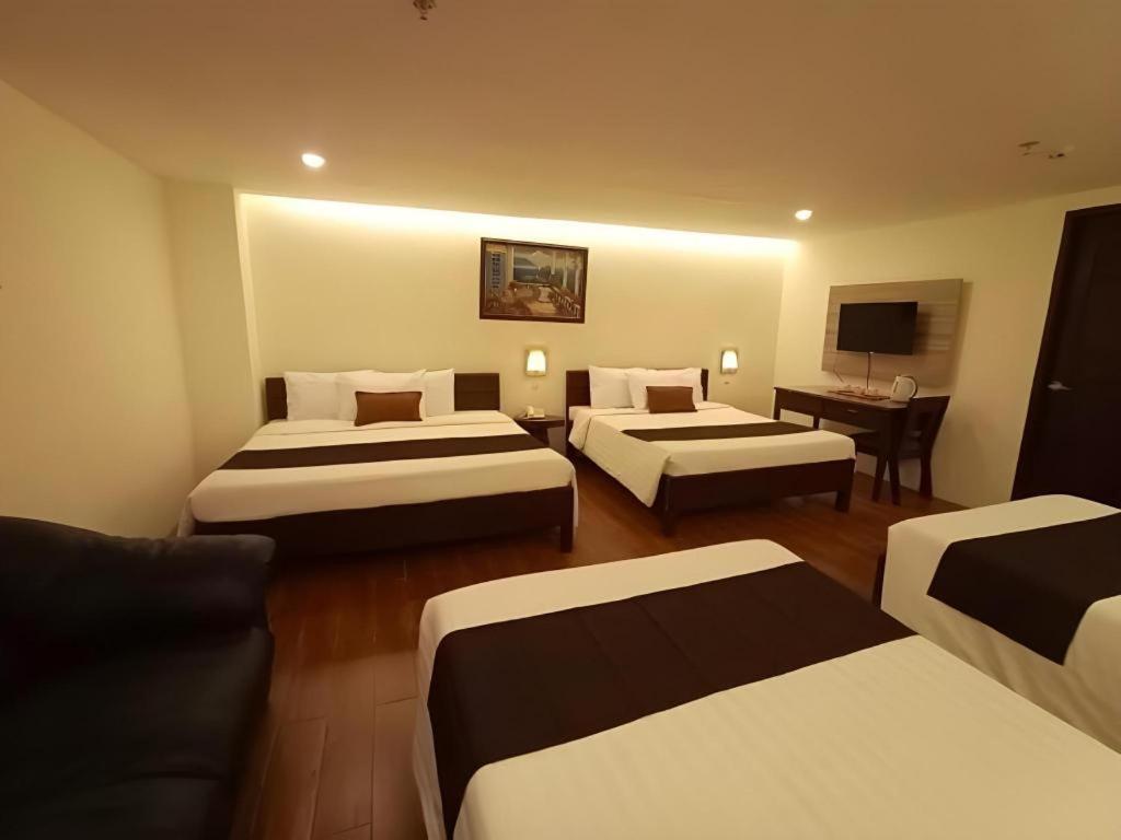 Hotel Asuncion Laoag Bagian luar foto