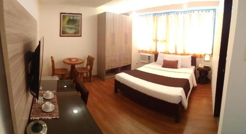 Hotel Asuncion Laoag Bagian luar foto